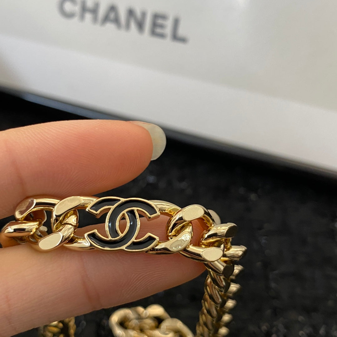 Signature Emblem Bracelet in Polished Metal-Tone – Black Detail – Design 002 close-up detail