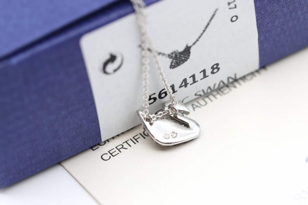 Swan Pendant Necklace in Gold-Tone – Black Detail styled product view