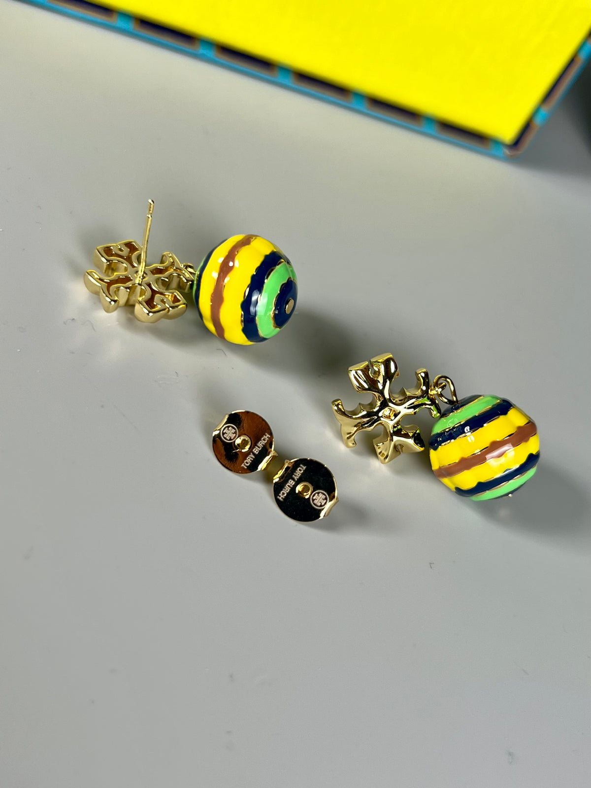 Signature Emblem Stud Earrings in Polished Metal-Tone – Design 027 front product view