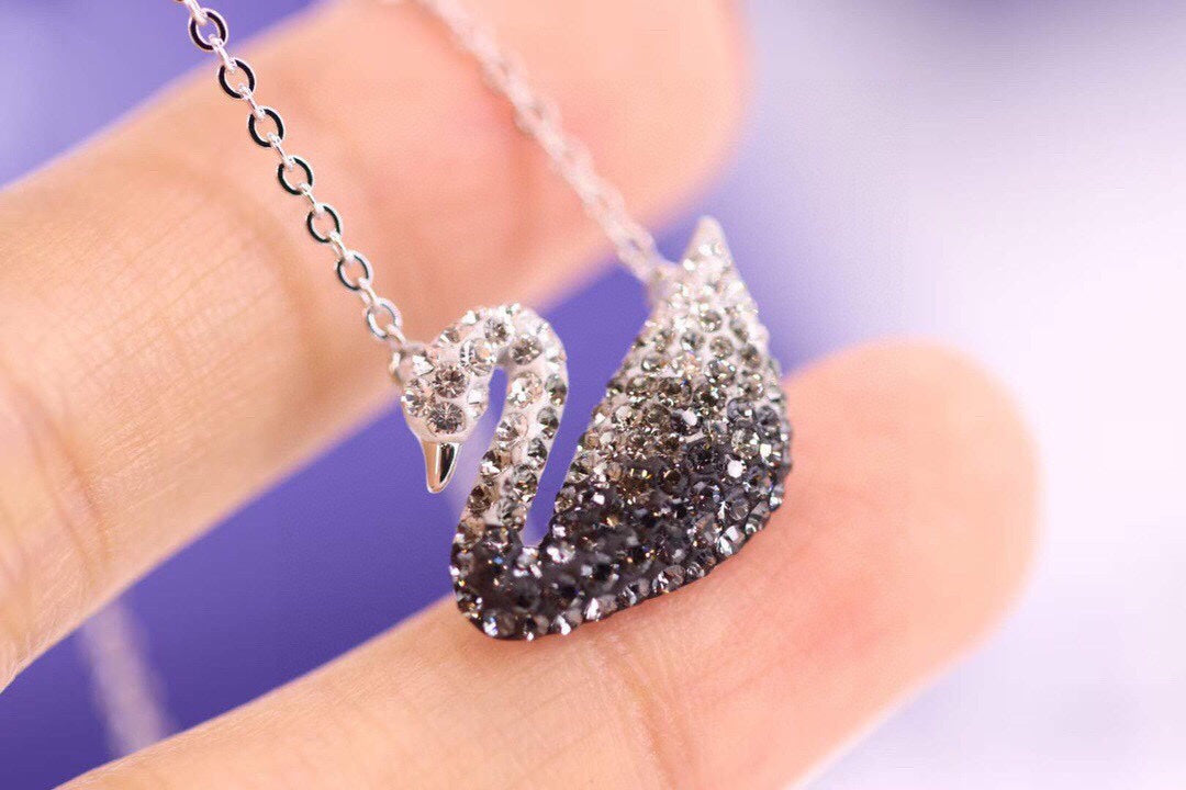 Swan Pendant Necklace in Gold-Tone – Black Detail front product view