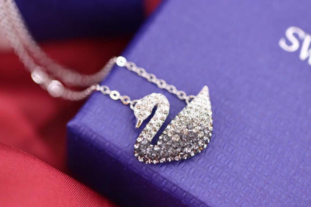 Swan Pendant Necklace in Gold-Tone – Black Detail detail view