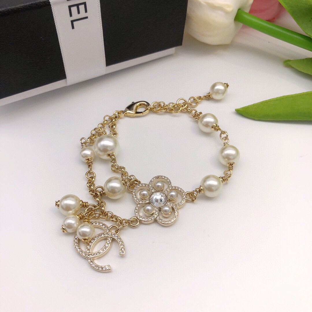 Double-C Emblem Bracelet in Gold-Tone – Pearl Detail – Design 005 styled product view