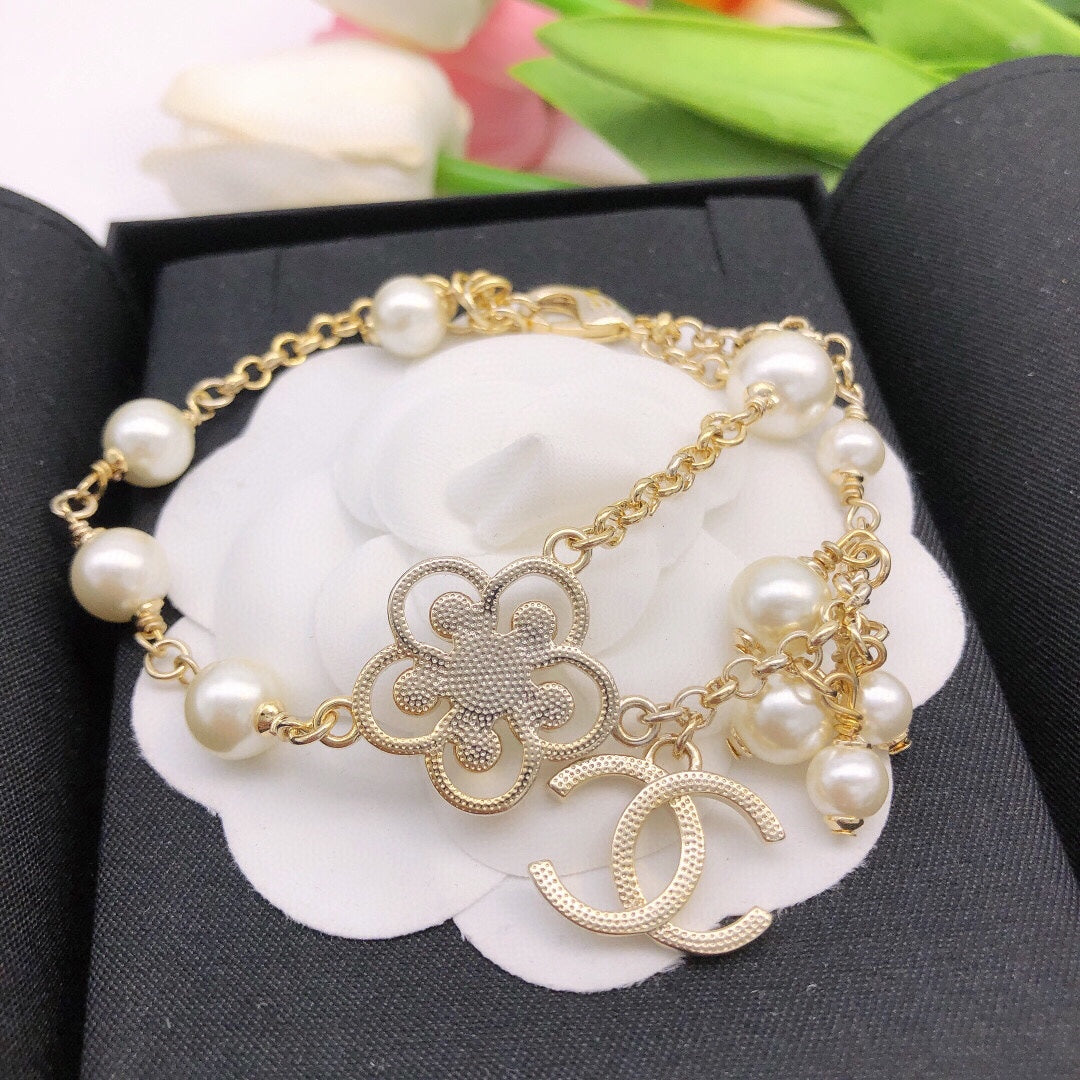 Double-C Emblem Bracelet in Gold-Tone – Pearl Detail – Design 005 detail view