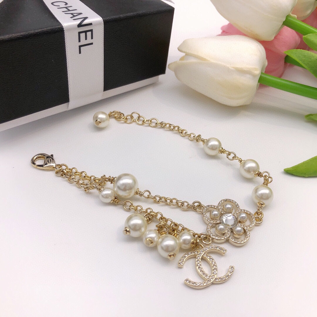 Double-C Emblem Bracelet in Gold-Tone – Pearl Detail – Design 005 close-up detail