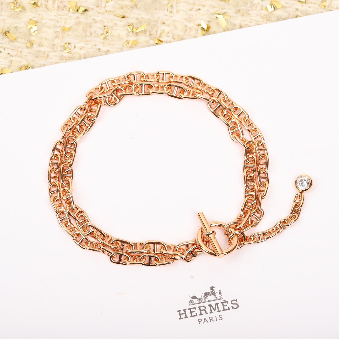 Signature Emblem Bracelet in Gold-Tone – Red Detail – Design 002 front product view