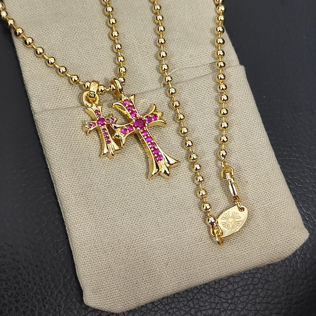 Double Cross Pendant Necklace in Metal-Tone – Pink Crystal Detail front product view
