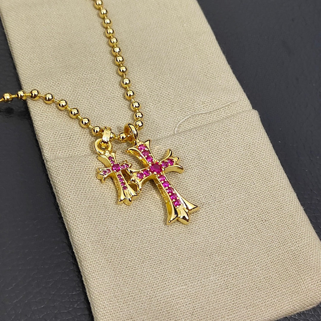 Double Cross Pendant Necklace in Metal-Tone – Pink Crystal Detail close-up detail