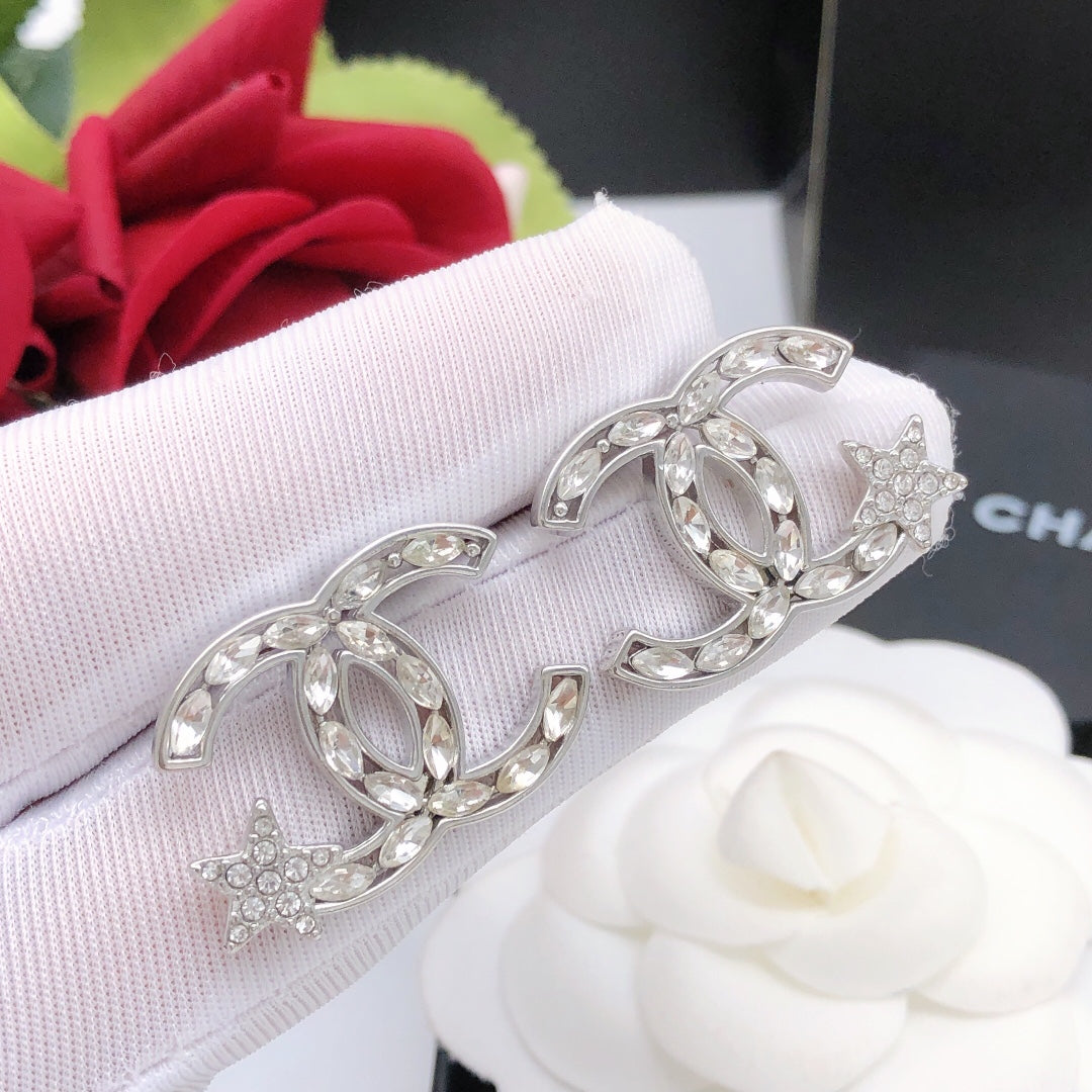 Double-C Emblem Stud Earrings in Polished Metal-Tone – Design 381 detail view