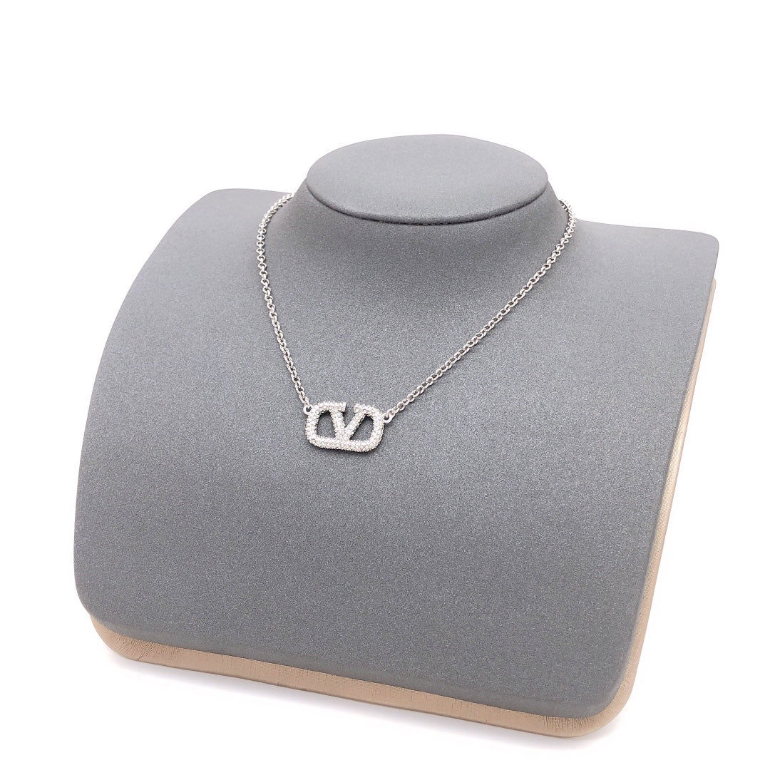Signature Emblem Crystal-Accent Pendant Necklace – Design 04 styled detail