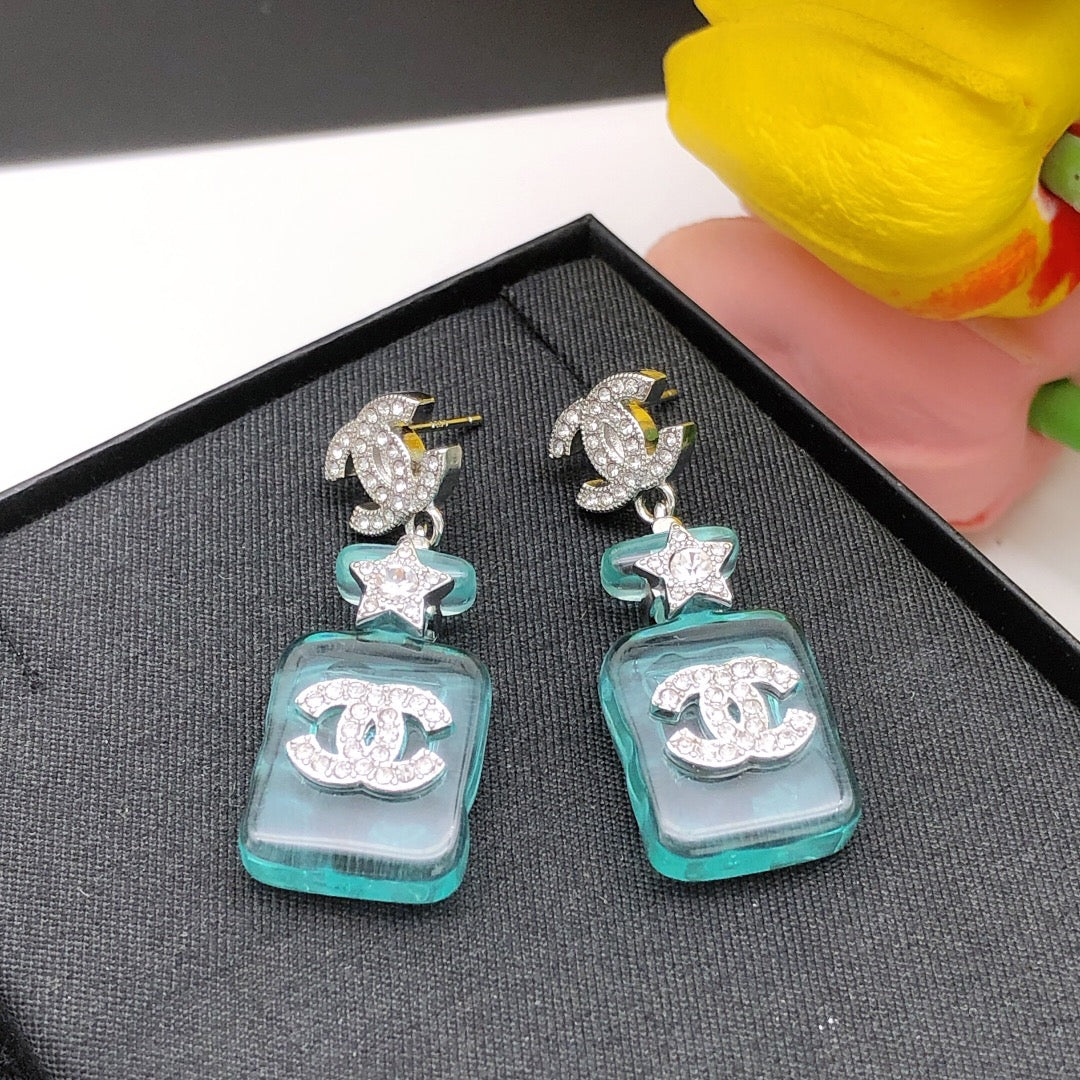 Signature Emblem Stud Earrings in Gold-Tone – Blue Detail – Design 002 front product view