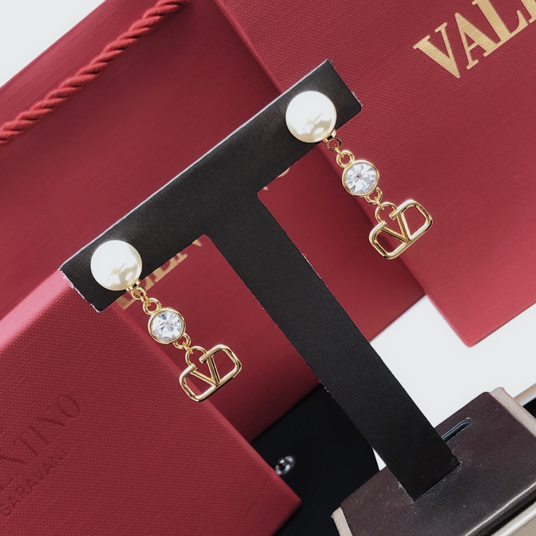 Signature Emblem Stud Earrings in Gold-Tone – Design 19 front view