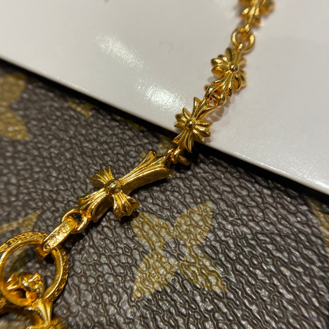 Cross Pendant Necklace in Gold-Tone – Ring Motif main product view