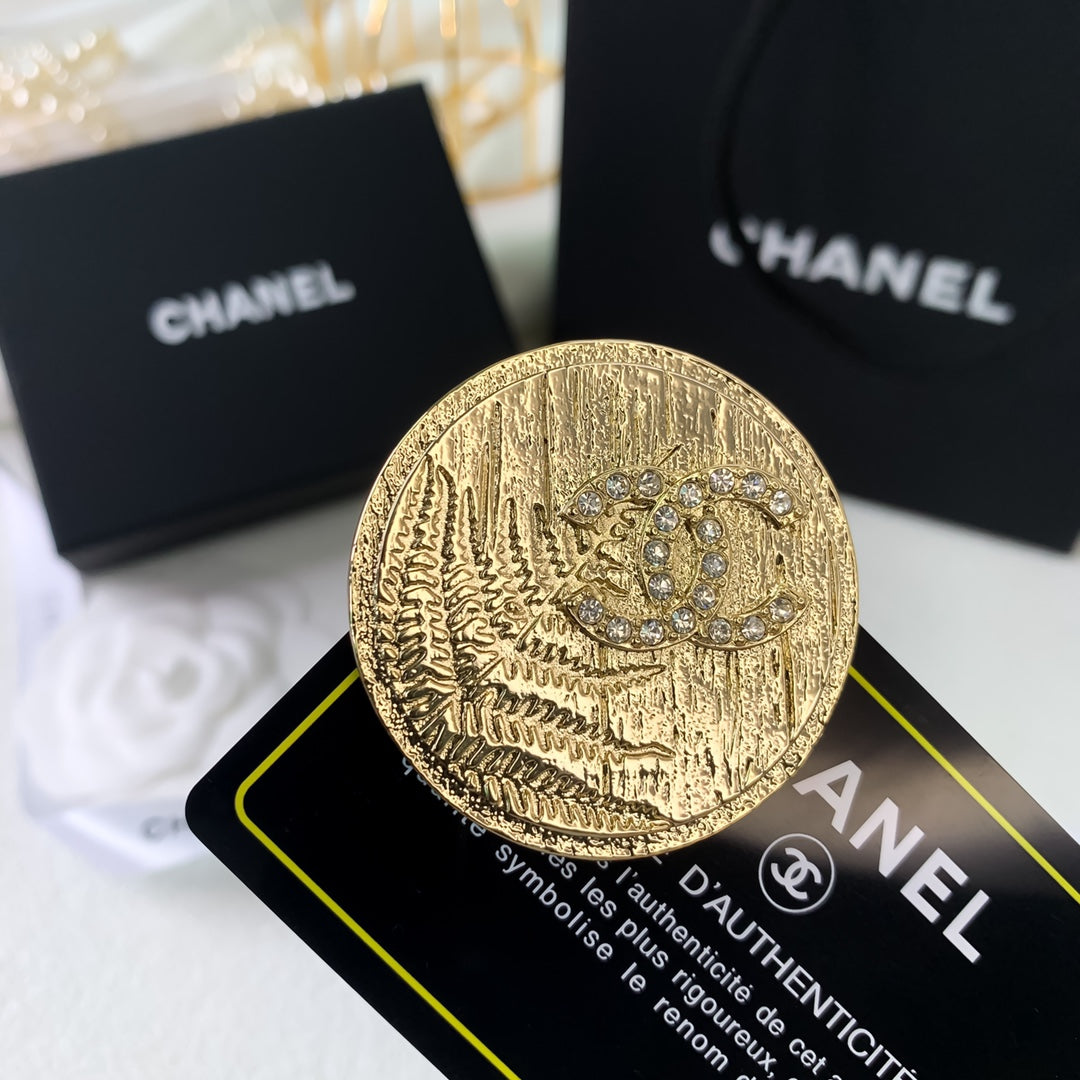 Double-C Emblem Brooch in Polished Metal-Tone – Design 036 detail view