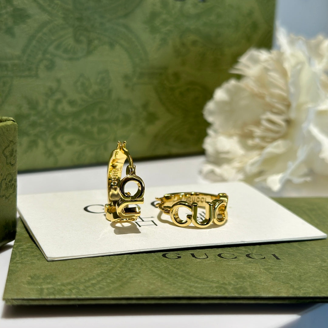 Letter Emblem Statement Earrings in Polished Metal-Tone main product view