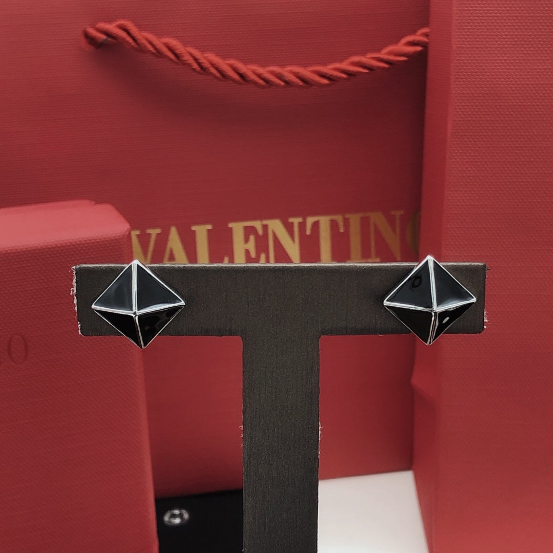 Signature Emblem Stud Earrings in Gold-Tone – Black close-up view