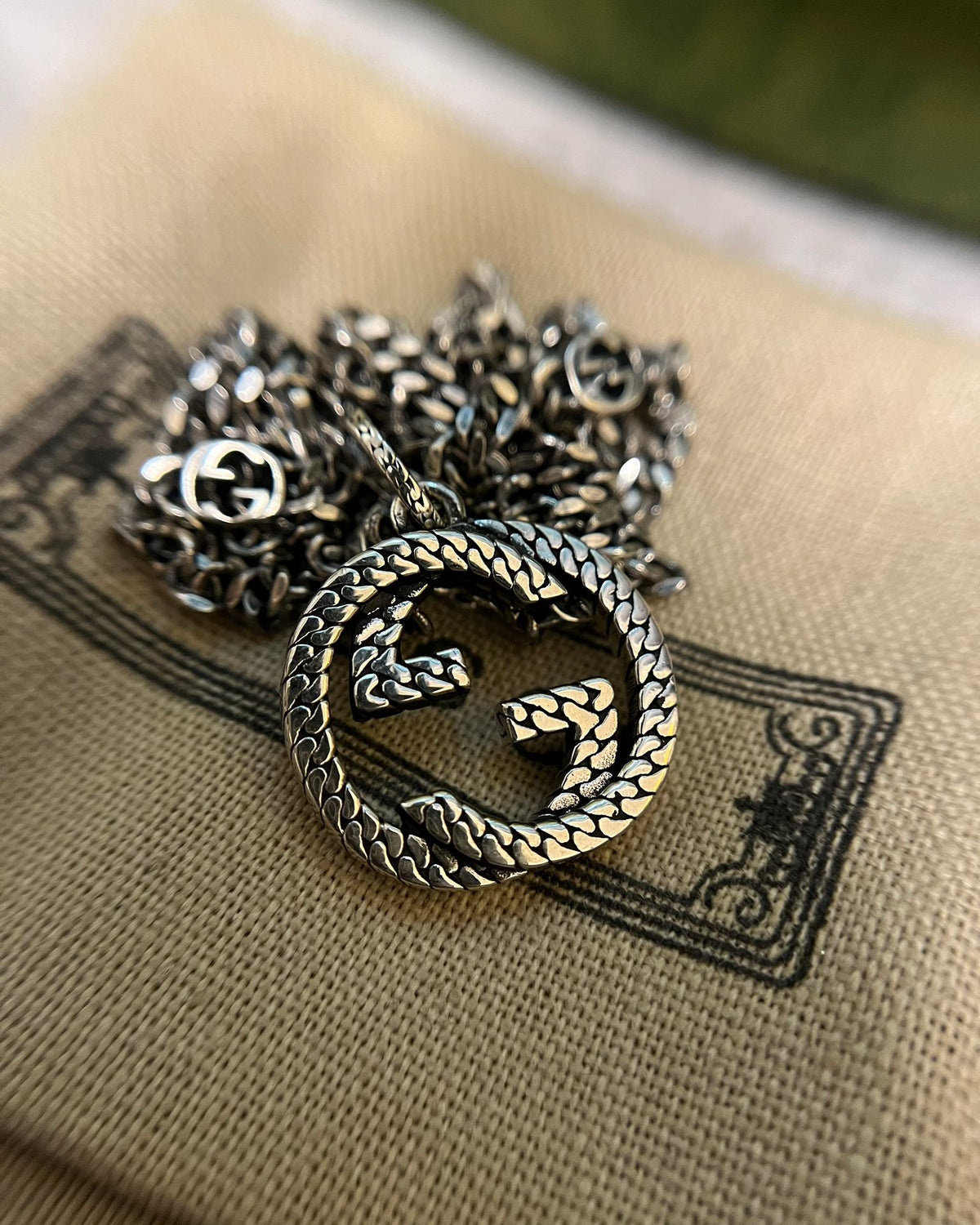 Double-G Emblem Pendant Necklace in Polished Metal-Tone – Vintage Detail – Design 043 side detail