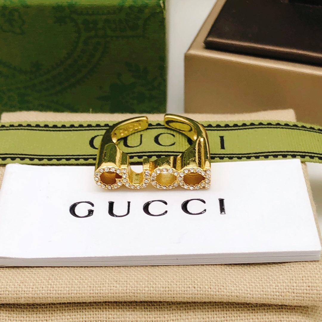 Letter Emblem Statement Ring in Gold-Tone close-up detail