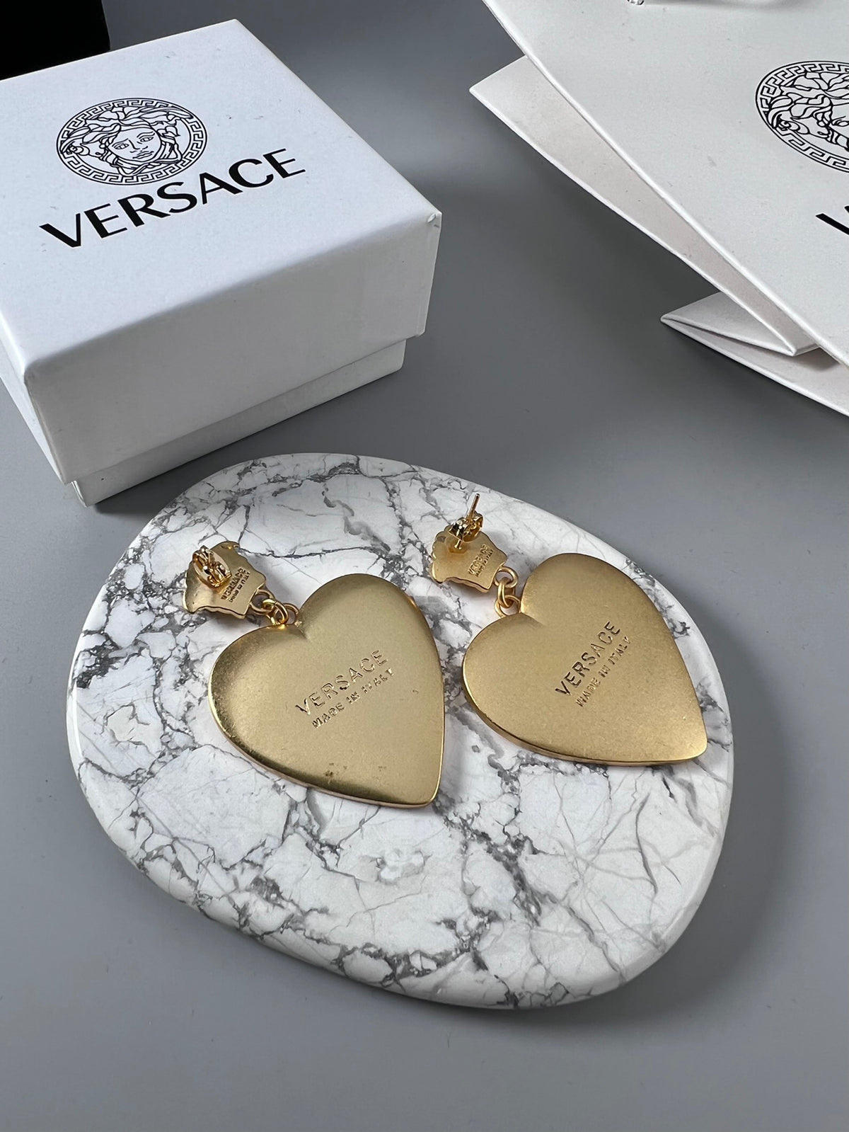 Statement Emblem Stud Earrings in Polished Metal-Tone – Design 01 close-up detail