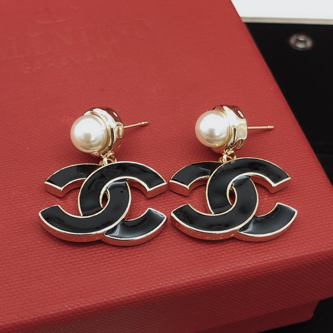 Signature Emblem Stud Earrings in Gold-Tone – Black Detail main product view