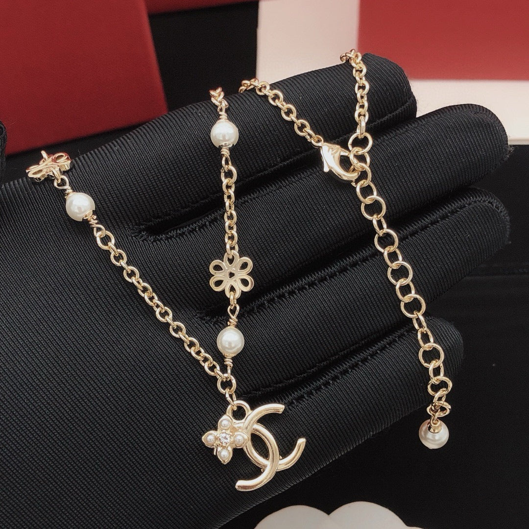 Camellia Pendant Necklace in Gold-Tone – Camellia Detail – Design 006 styled product view