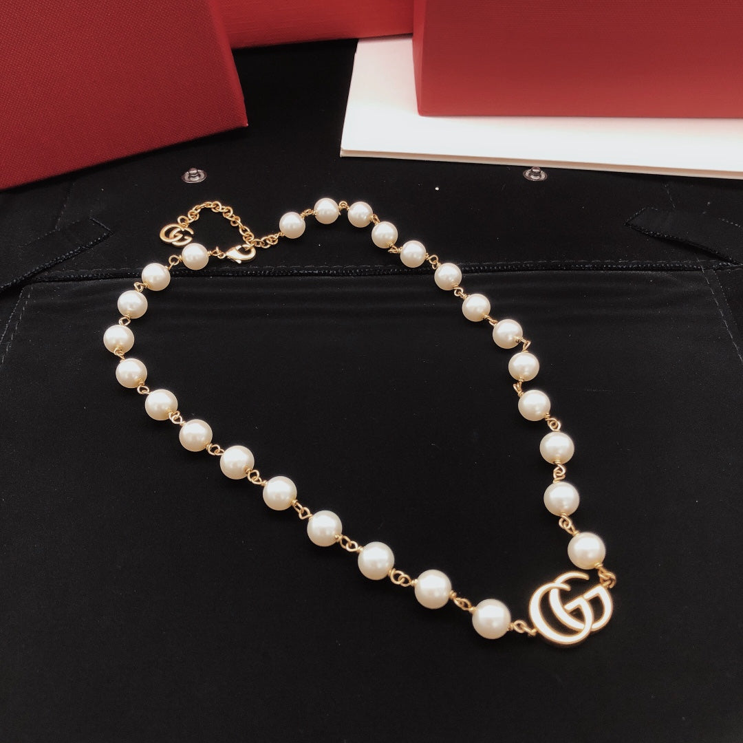 Geometric Emblem Pendant Necklace in Gold-Tone – Design 012 front product view