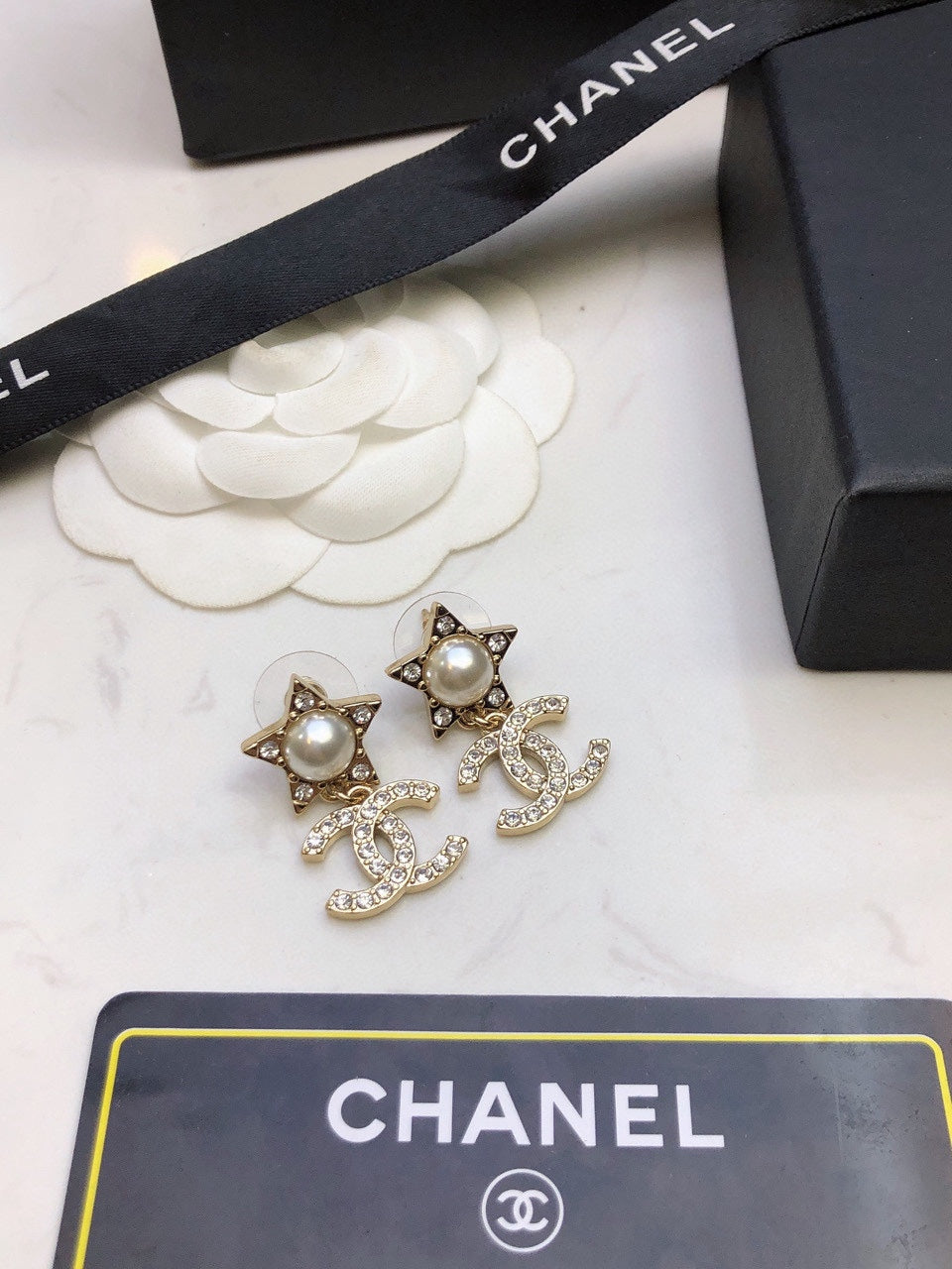 Double-C Emblem Pearl-Detail Stud Earrings – Pearl Detail – Design 027 main product view