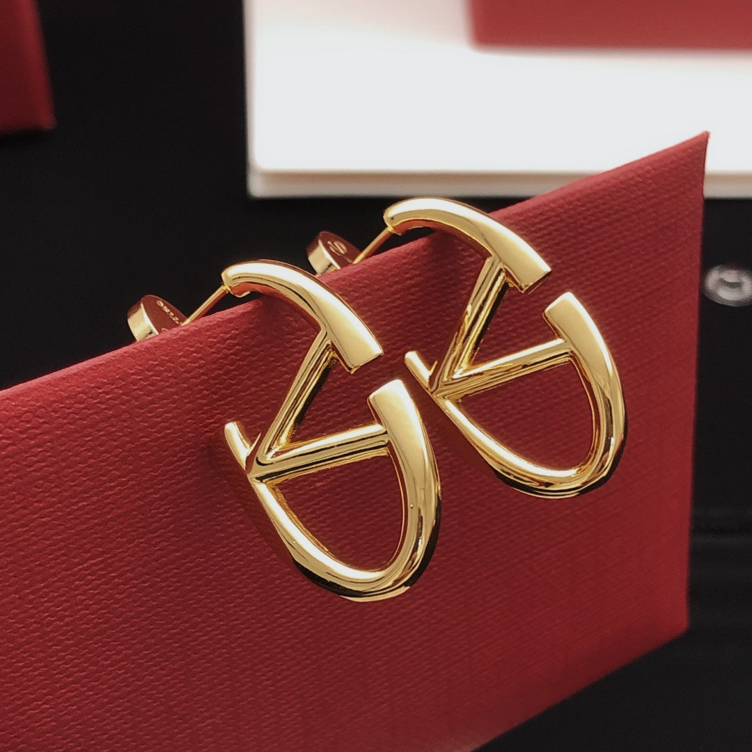 Signature Emblem Polished Stud Earrings – Small detail view