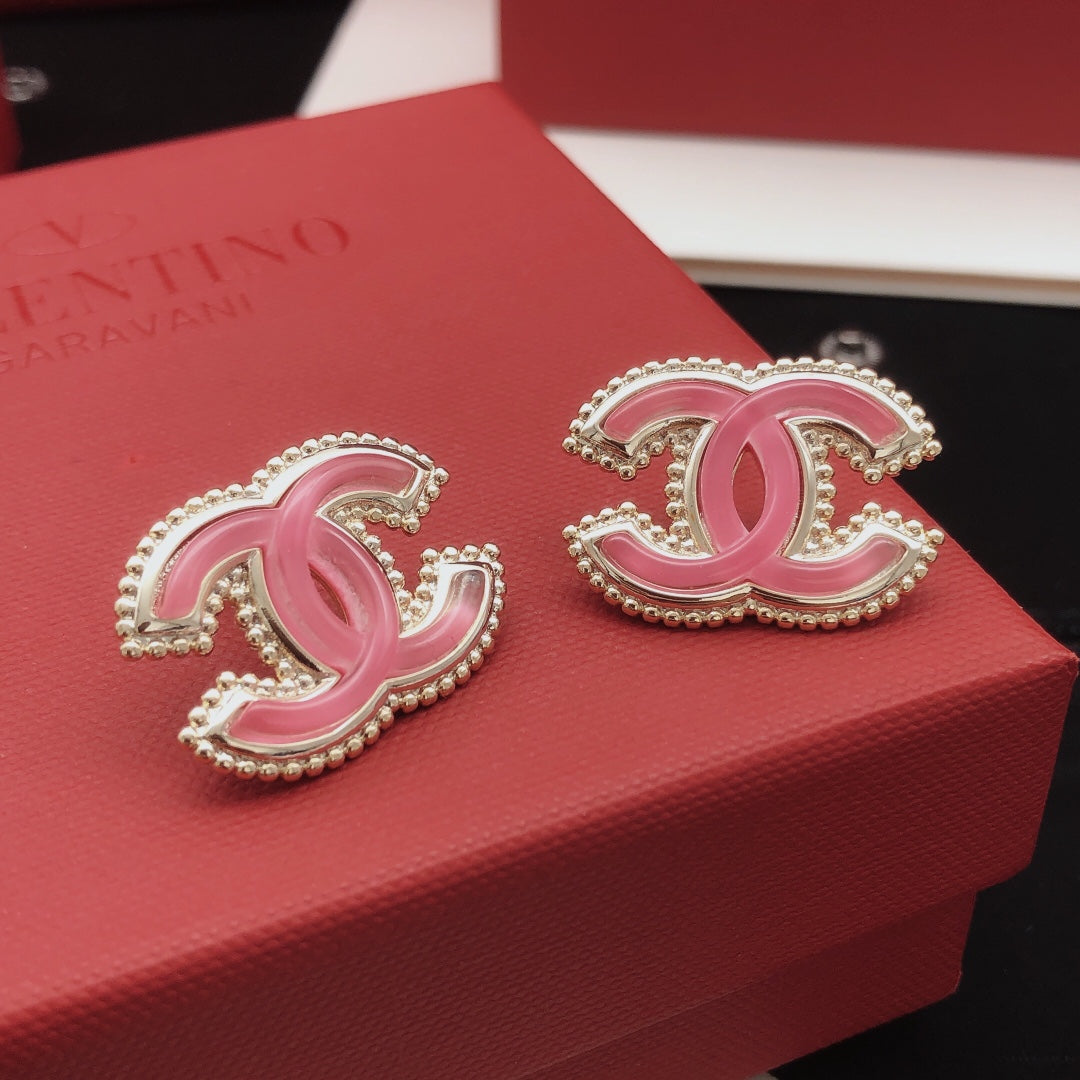 Double-C Emblem Stud Earrings in Gold-Tone – Pink Detail front product view