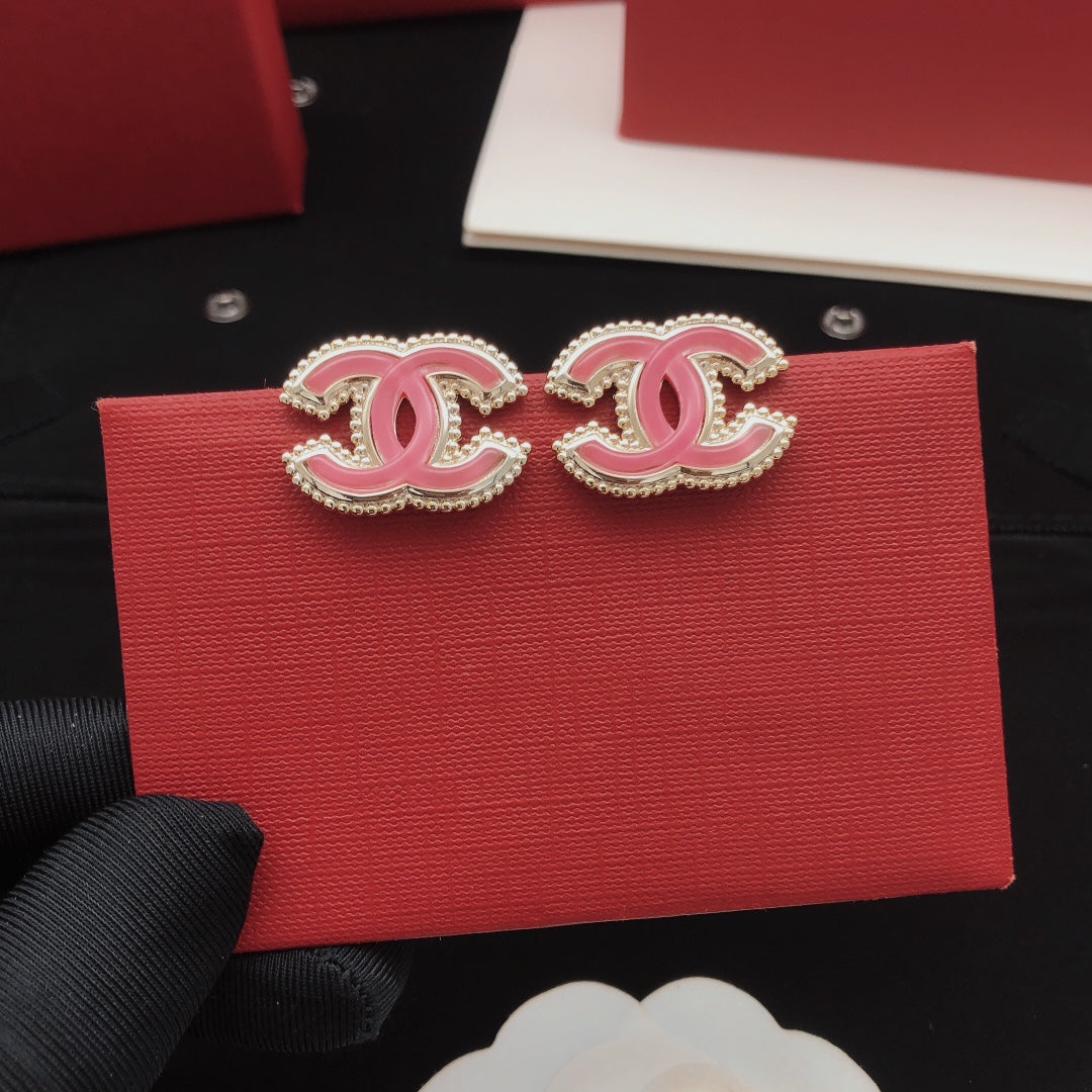 Double-C Emblem Stud Earrings in Gold-Tone – Pink Detail front product view