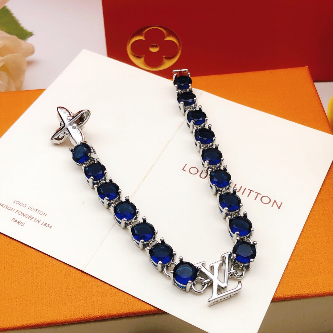 Geometric Emblem Bracelet in Gold-Tone – Blue Detail – Design 010 front product view