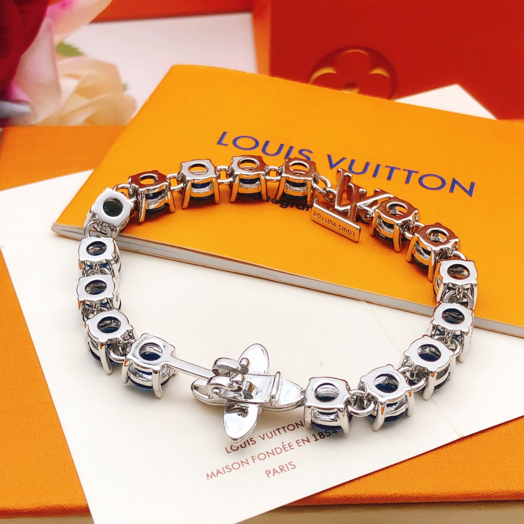 Geometric Emblem Bracelet in Gold-Tone – Blue Detail – Design 010 styled product view