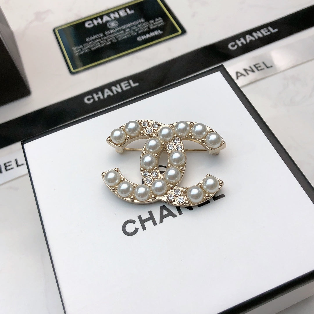 Signature Emblem Brooch in Polished Metal-Tone – Design 034 front product view