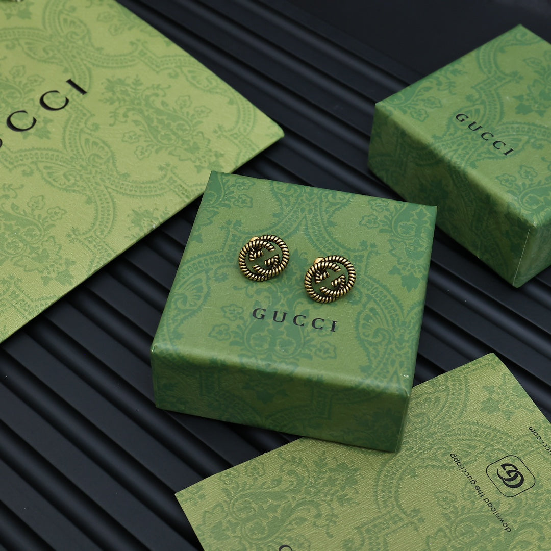 Serpentine Stud Earrings in Polished Metal-Tone styled product view