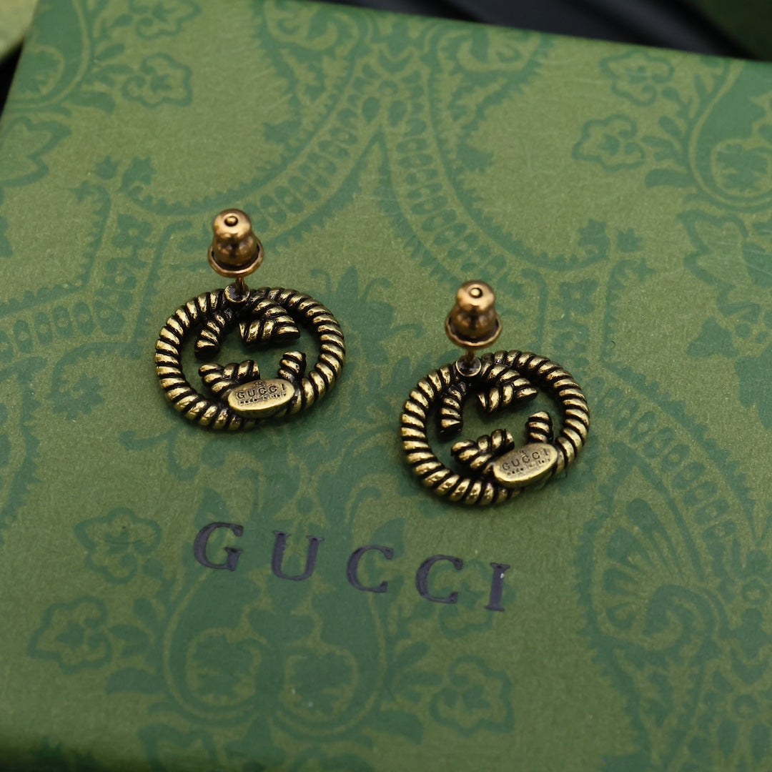Serpentine Stud Earrings in Polished Metal-Tone side detail