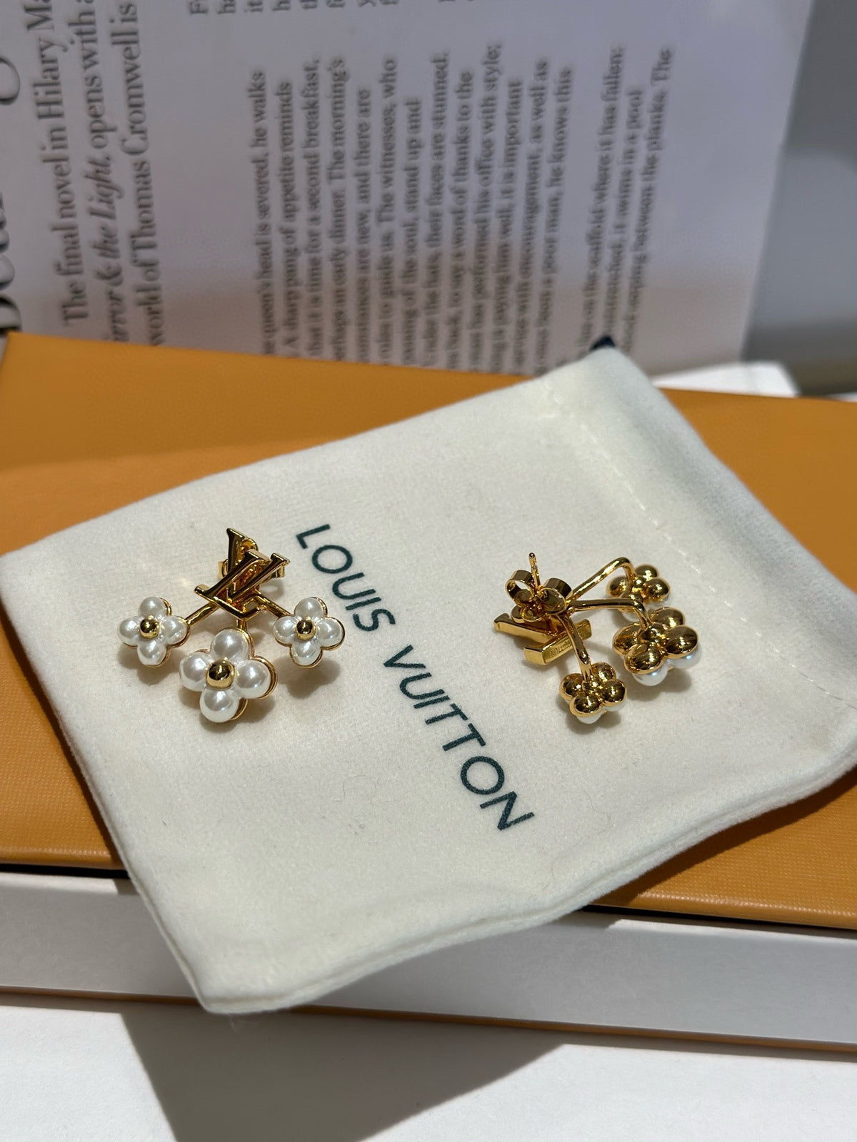 Geometric Emblem Statement Earrings in Polished Metal-Tone close-up detail