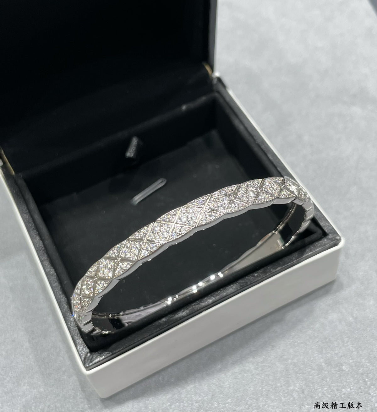 Signature Emblem Bangle in Polished Metal-Tone – Design 032 detail view
