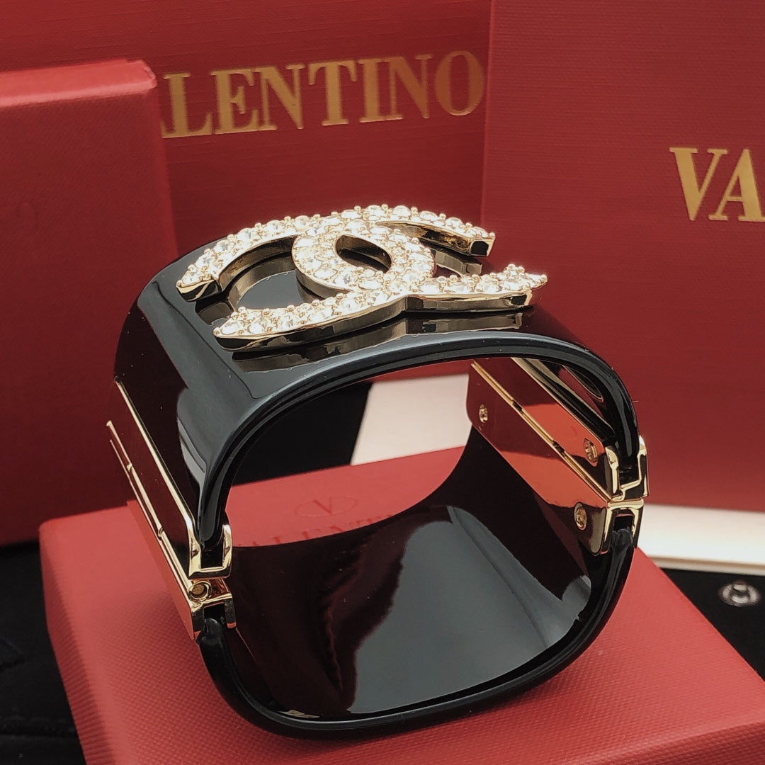 Signature Emblem Bangle in Gold-Tone – Black Detail – Design 004 front product view