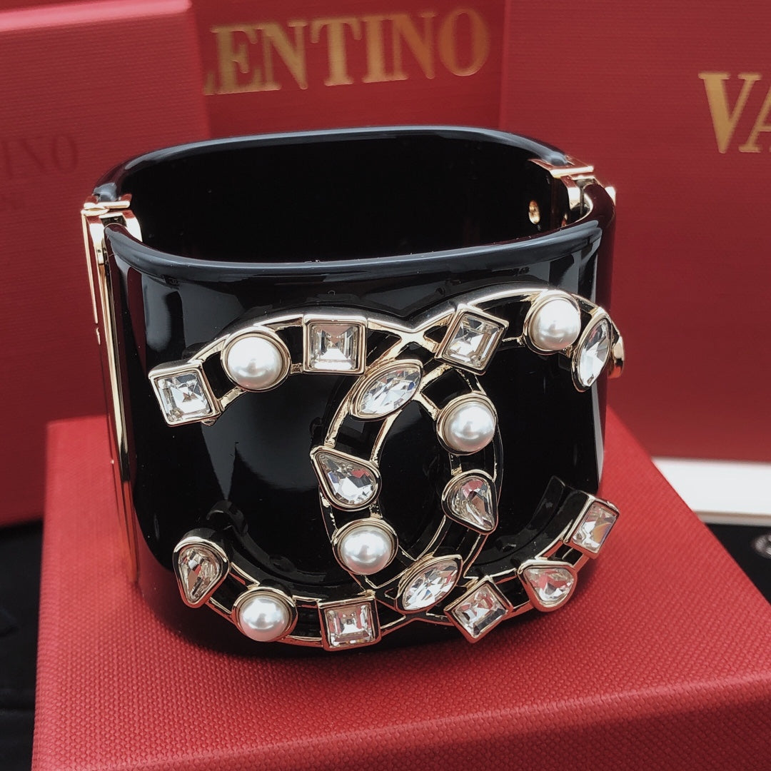 Signature Emblem Bangle in Gold-Tone – Black Detail – Design 002 front product view