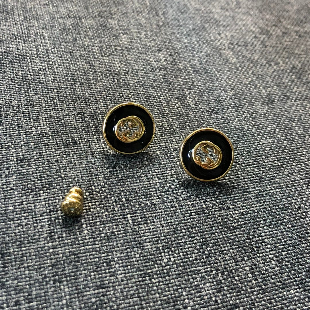 Double-G Emblem Stud Earrings in Polished Metal-Tone – Design 031 styled product view