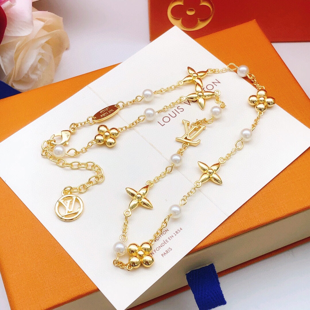 Floral Pendant Necklace in Gold-Tone – Pearl Detail styled product view