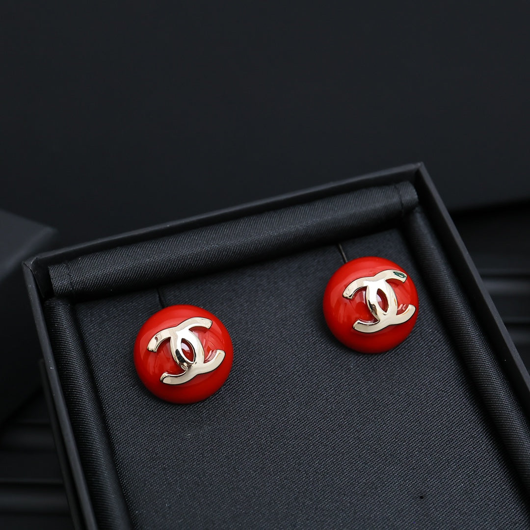 Signature Emblem Stud Earrings in Polished Metal-Tone – Red Detail close-up detail