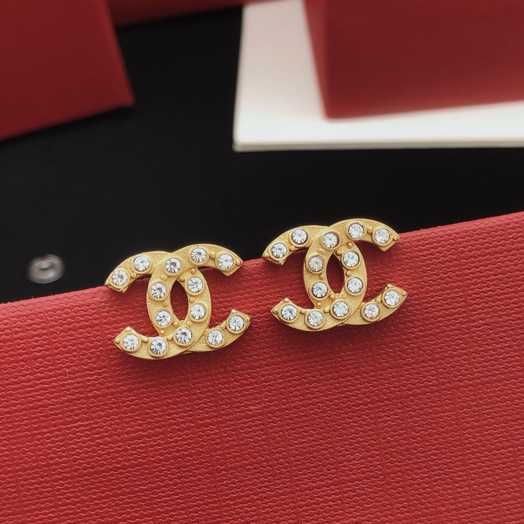 Signature Emblem Crystal-Accent Stud Earrings – White Detail styled product view