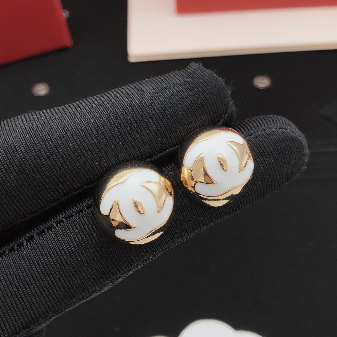 Round Stud Earrings in Gold-Tone – White Detail styled product view