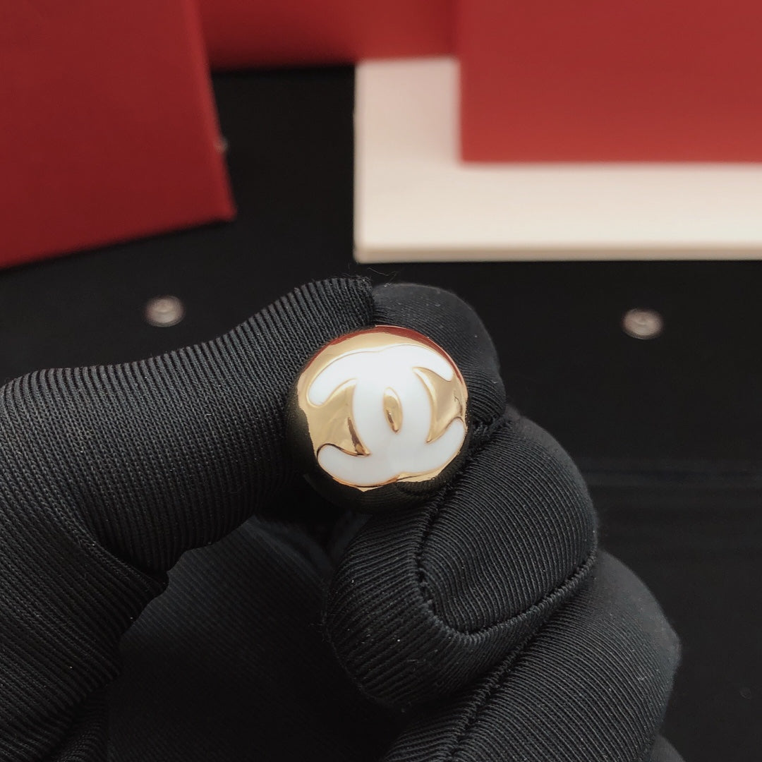 Round Stud Earrings in Gold-Tone – White Detail close-up detail