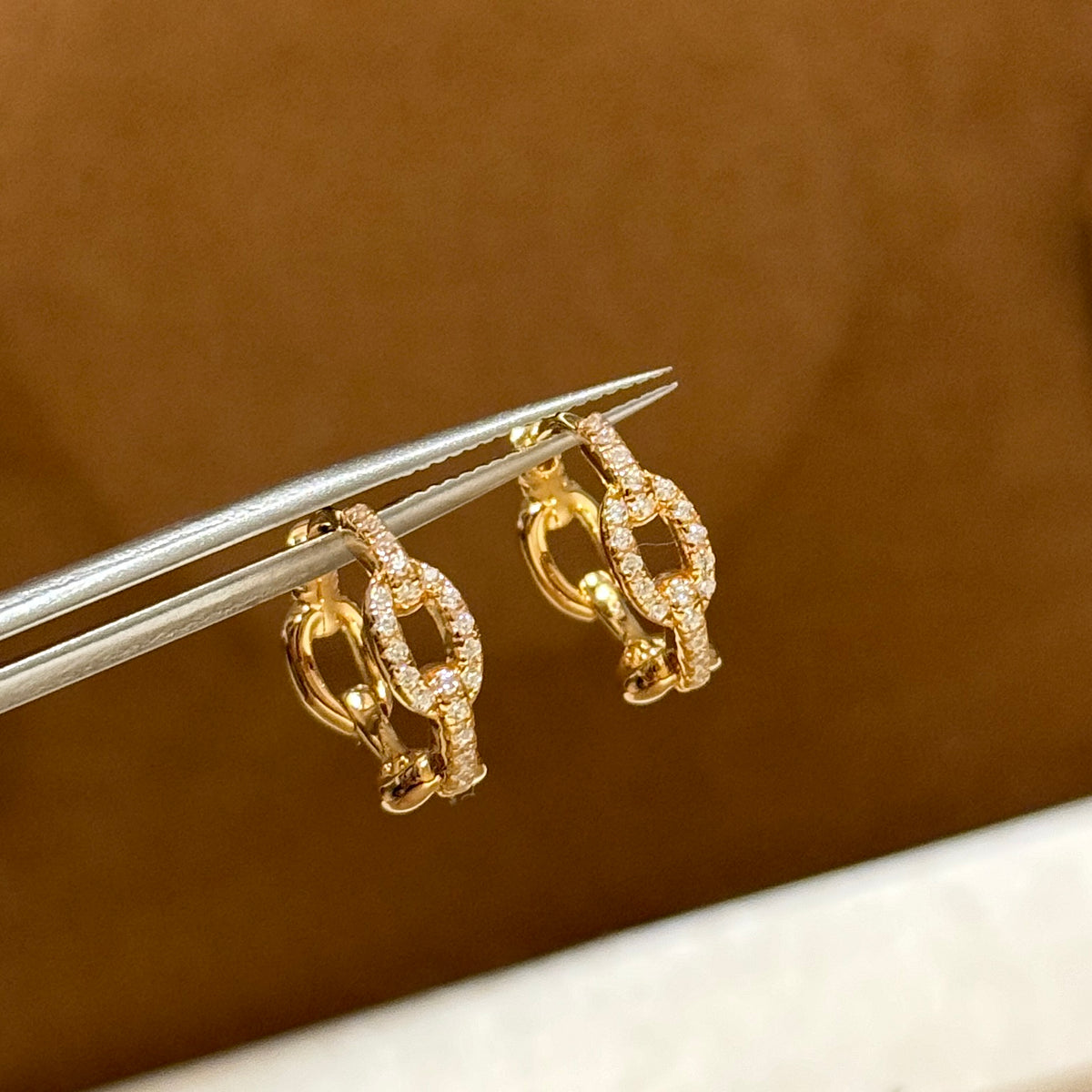 Signature Emblem Crystal-Accent Stud Earrings – Red Detail – Design 002 close-up detail