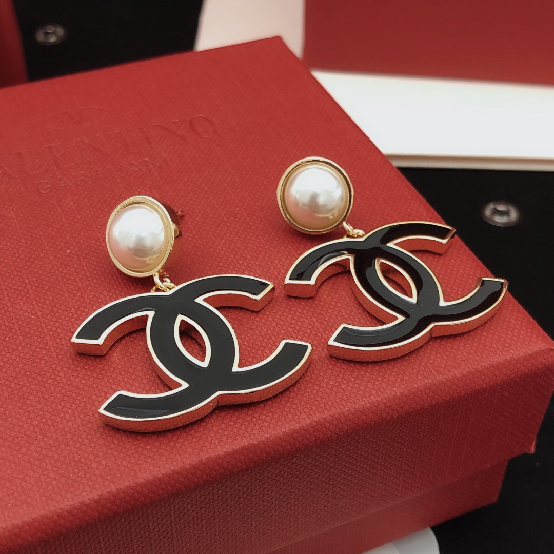 Signature Emblem Stud Earrings in Gold-Tone – Black Detail – Design 002 front product view