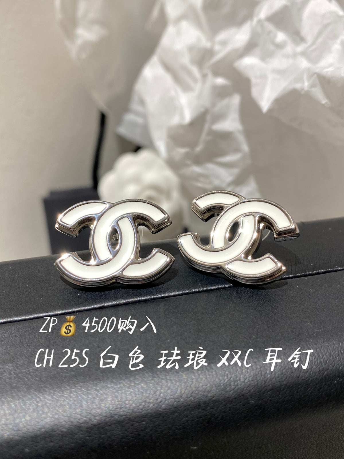 Double-C Emblem Stud Earrings in Polished Metal-Tone – White Detail – Design 004 main product view