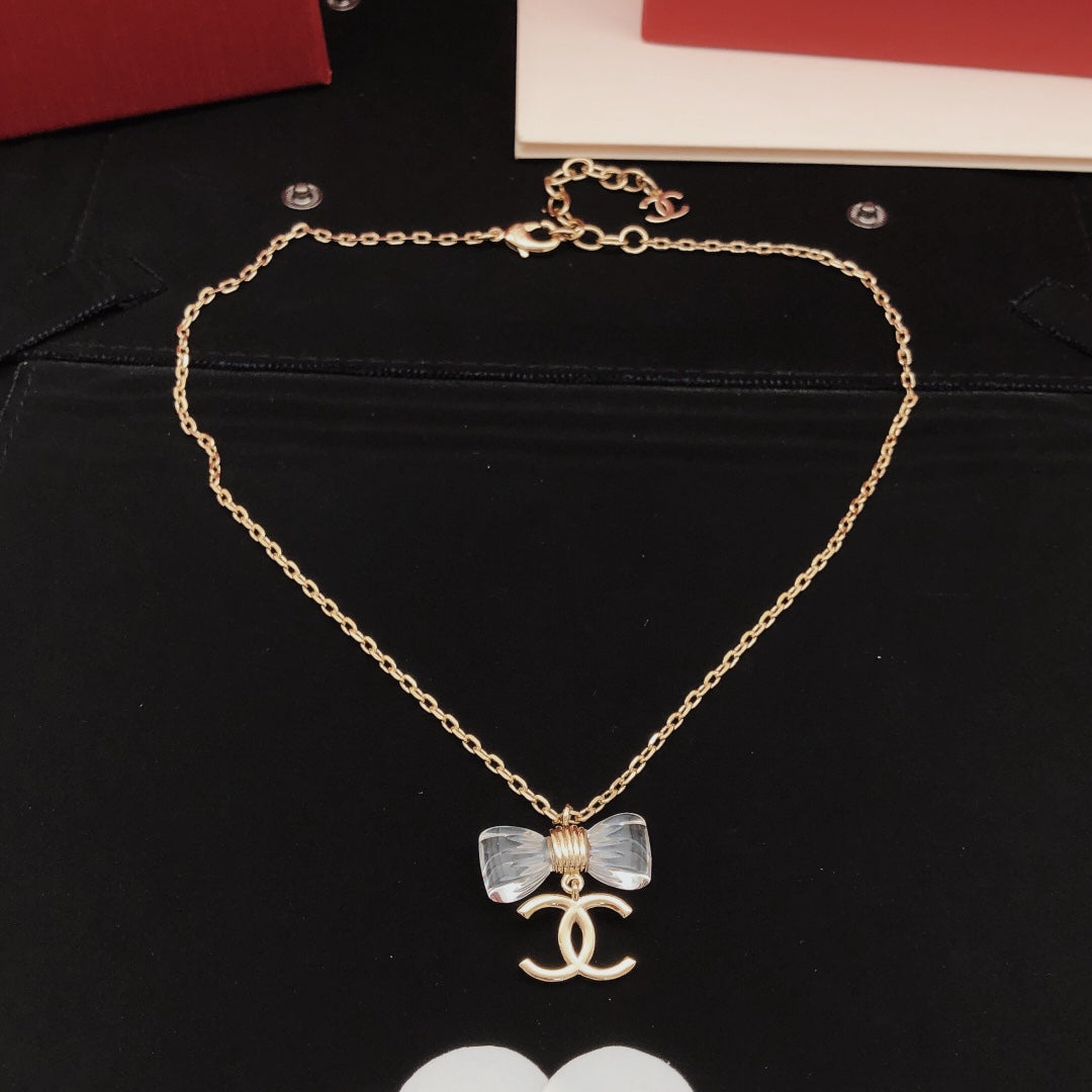 Bow Pendant Necklace in Gold-Tone – Design 006 styled product view