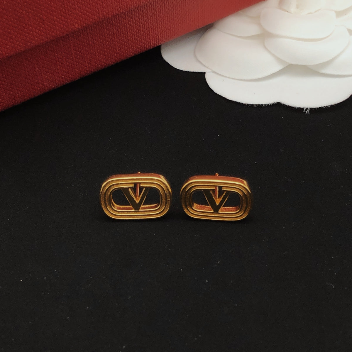 Signature Emblem Polished Stud Earrings – Design 04 front view