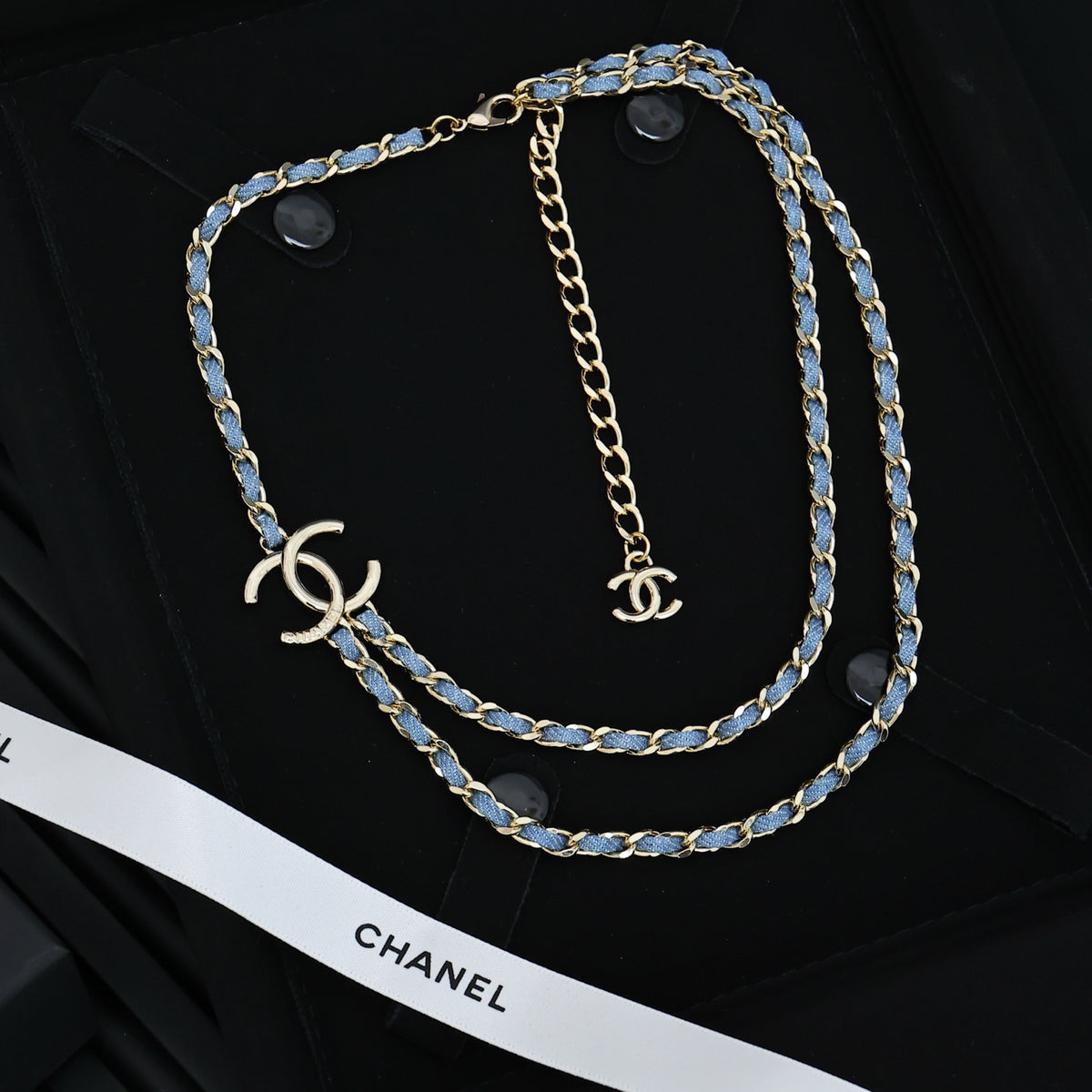 Double-C Emblem Jewelry Accessory in Polished Metal-Tone – Blue Detail detail view